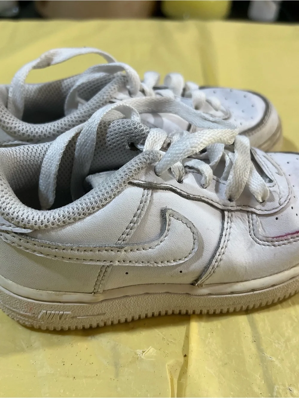 Nike Kids White Lace-Up Sneakers with Subtle Red Accent